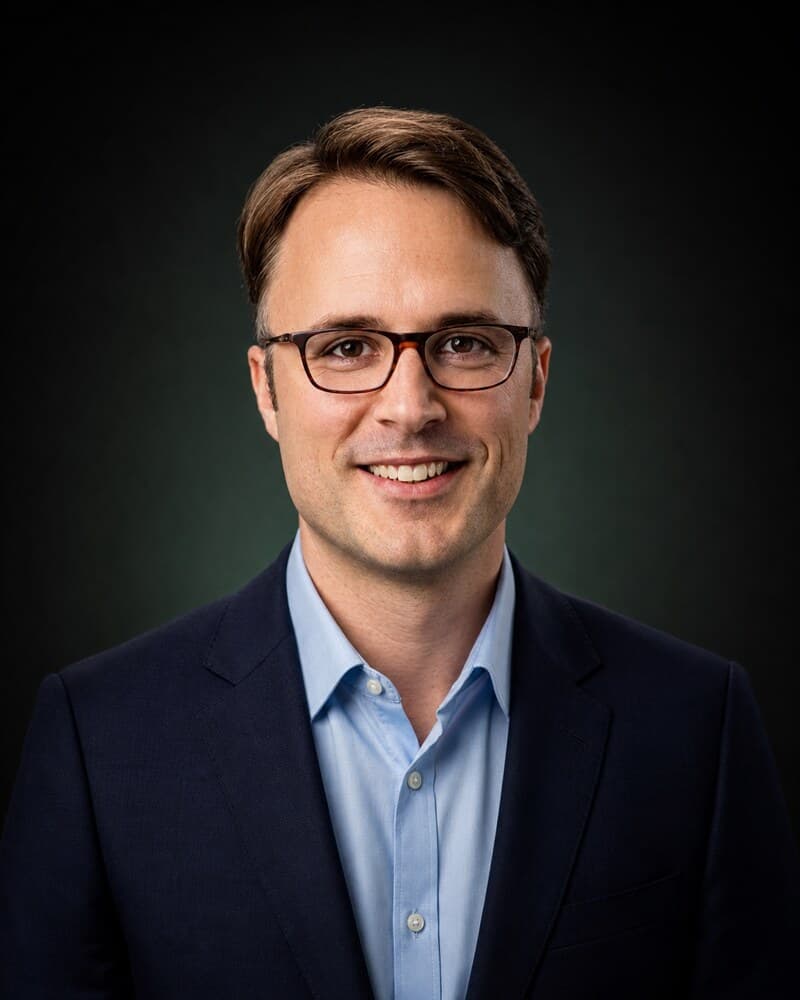 Portrait of Dr Alex Mathy